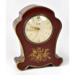 A 1950s Swiza Mignon musical alarm clock.