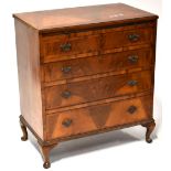 An Edwardian walnut crossbanded four-drawer bachelor's chest,