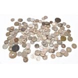 A quantity of assorted foreign coins/tokens.