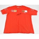 MICHAEL SCHUMACHER; a signed Ferrari Fila official shirt with embroidered logos, size L.