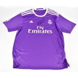 CRISTIANO RONALDO; an Adidas Real Madrid purple shirt, signed to front, size XL. Additional