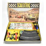 SCALEXTRIC; a boxed set 50, appears complete with three vehicles, track, accessories and operating