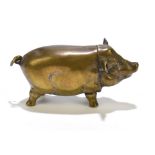 A brass novelty vesta case in the form of a pig, length 5cm.