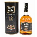 WHISKY; a single bottle of Whyte and Mackay Aged 12 Years Premium Reserve Blended Scotch Whisky,