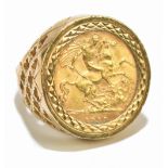 A George V half sovereign, 1913, in a 9ct yellow gold pierced ring mount, size L, approx 10.7g.