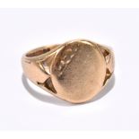 A 9ct yellow gold signet ring, size P 1/2, approx 5.3g.