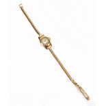 STAYTE; a lady's vintage 18ct yellow gold wristwatch with circular dial and 'Snake' bracelet,