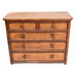 A Victorian oak chest of two short and three long drawers.