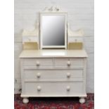A painted dressing table with mirrored back and base of two short and two long drawers, width 97cm.