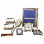 An Edwardian hallmarked silver mounted leather pocket watch case, with embossed foliate detailing,