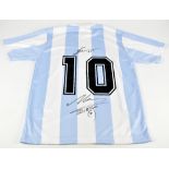 DIEGO MARADONA & LIONEL MESSI; an Argentina home shirt, signed to back with printed number 10 to
