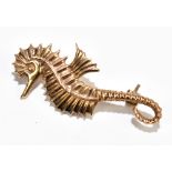 GEOFFREY G. BELLAMY; a 9ct yellow gold brooch in the form of a seahorse, length 40mm, approx 4.7g.