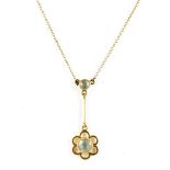 A yellow metal and aquamarine drop pendant, with a flower head shaped drop, with a 9ct chain,