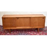 BEITHCRAFT LTD; a mid century teak sideboard with two sliding doors flanked on one side by three