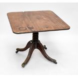 A George IV mahogany breakfast table.