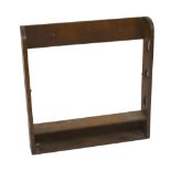 An early 20th century oak gun stand/rack, with space for three guns, height 78cm, width 77cm,