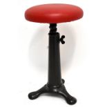 SINGER; an iron framed adjustable machinist's stool, with rising top and later red cushion, height