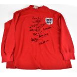 ENGLAND 1966 WORLD CUP WINNERS; a Toff’s England retro style home shirt, signed by Peters, Hurst,