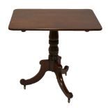 A 19th century mahogany tilt-top tripod table, raised on swept feet, height 71cm.