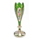 A late 19th century Bohemian green glass floral painted gilt heightened and white enamel decorated