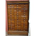 AMBERG; the Amberg Imperial letter file, a walnut cabinet with moulded cornice above tambour front