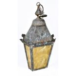 A hexagonal copper lantern with marbled glass panels, height 68cm.Additional InformationOne of the