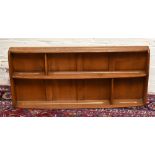 ERCOL; an elm hanging shelf with stepped arrangement, width 107cm.