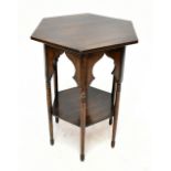 An Edwardian oak octagonal occasional table.