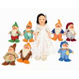 CHAD VALLEY; Snow White and the Seven Dwarfs, a set of eight Walt Disney toys by Chad Valley from