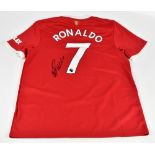 CRISTIANO RONALDO; an Adidas Manchester United 2021 home shirt, signed to reverse, size large.