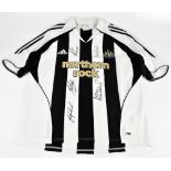 NEWCASTLE UNITED; a Newcastle United home shirt, signed by Robson, Shearer, Beardsley, Keegan and