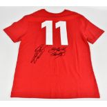RYAN GIGGS AND GARETH BALE; a Wales football shirt, signed to reverse, size M. Additional