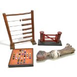 A collection of assorted vintage toys including a horse's hoof from a fairground carousel, abacus,