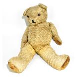 A large vintage gold plush teddy bear with leather pads, length 65cm.