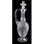 A fine quality 19th century glass ewer with stopper, probably Webb, with detailed foliate scroll and