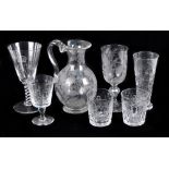 A small group of glassware including a well etched jug, a similarly decorated beaker, a William