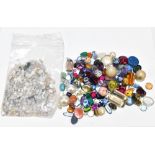 A quantity of loose gemstones including a large quantity of opals and various coloured stones.