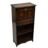 An early 20th century oak student's bureau, with fall front above drawer and shelf, width 53cm,