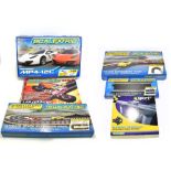 SCALEXTRIC; a McLaren MP4-12C track and car set with two cars and track in original box, together