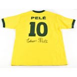 PELÉ (EDSON ARANTES DU NASCIMENTO); a 1970s Brazil home shirt, signed to back, size S. Additional
