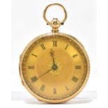 An 18ct yellow gold key wind open faced pocket watch with Roman numerals to the dial and engraved