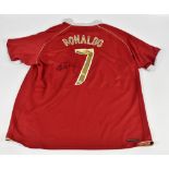 CRISTIANO RONALDO; a Nike Manchester United 2006-2007 home shirt, signed to reverse, size XL.