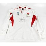 JOHNNY WILKINSON; a Nike England World Cup Champions 2003 rugby shirt, signed to the front, size XL.