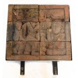 A 14th/15th century Javanese Majapahit Kingdom terracotta plaque, with six panels representing two