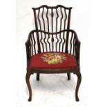 An Edwardian mahogany salon chair of 18th century style, with tapestry seat on cabriole legs, height