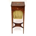 An Edwardian mahogany and painted sewing table, the hinged lid enclosing a later compartmentalised