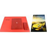 FERRARI; a leather Italian made wallet, a Ferrari card holder, a boxed Ferrari leather owner's