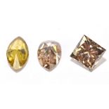 Three loose cinnamon coloured diamonds weighing 0.55ct, 0.36ct, and 0.36ct. Footnote: Due to these