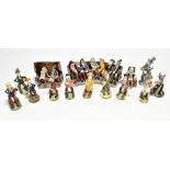 WILL YOUNG; a pottery figure group of seven characters seated upon a tavern bench, length 26cm, a