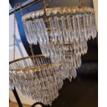 A pair of crystal glass ceiling lights with 3 additional wall lights. Spares of droplets makes it